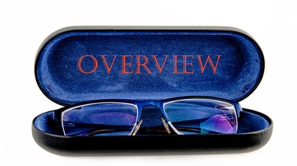 OVERVIEW written on an open case with eyeglasses