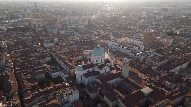 Drone footage of Cathedral of Santa Maria Assunta and Pegol Tower in Brescia city, Lombardy, Italy