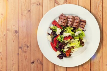 Barbecue beef meat tasty hot steak on plate.