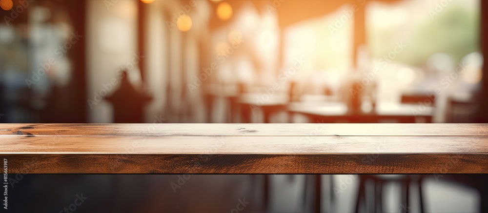 Aufkleber Empty wooden table space platform and blurred resturant or coffee shop background for product display montage. copy space available