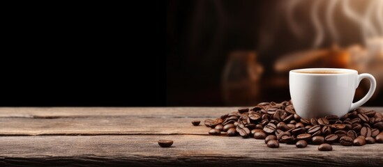 a paper cup of black coffee and coffee beans on wooden table. copy space available