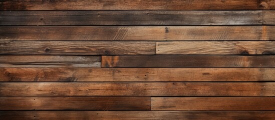 close up of brown planks of construction with old paint natural wood texture narrow boards horizontal wallpaper building material background for designer with copy space