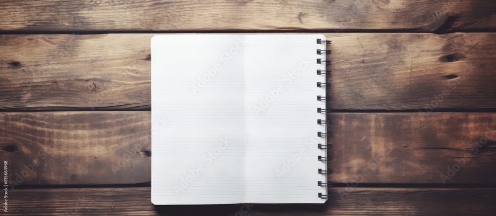 Aufkleber vintage style pictures of blank notebook paper on a wooden background with a vintage effect providin