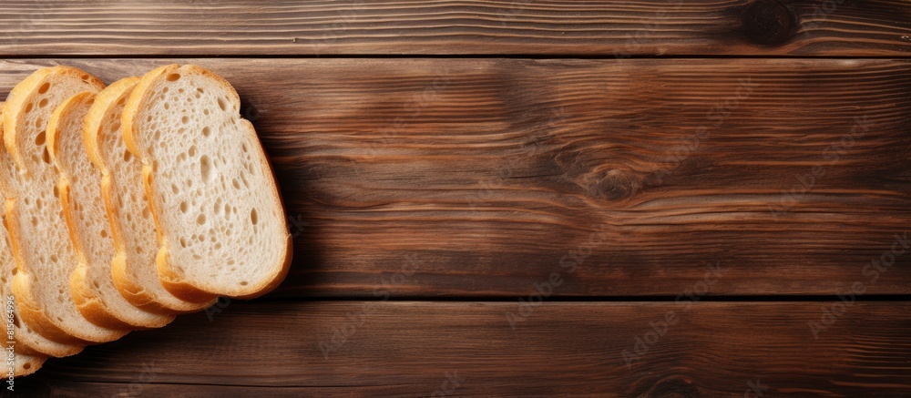 Aufkleber Sliced bread on wooden table Top view with space for text or recipe. copy space available
