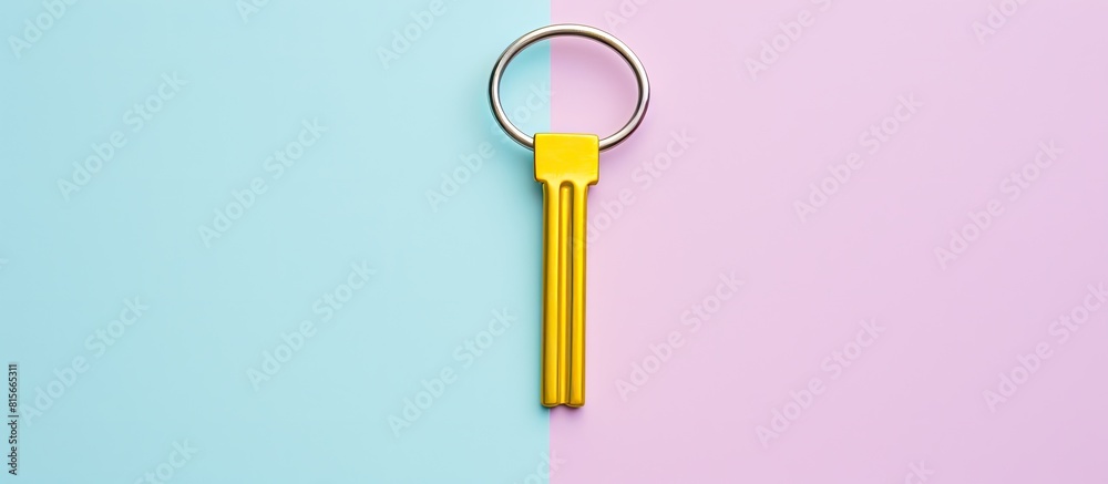 Aufkleber Golden key on a multicolored background top view Trendy colorful photo Minimal style with colorful paper backdrop Flat lay concept golden key on pastel background Trendy minimal flat lay concept