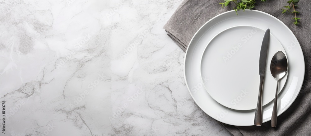 Poster a minimalistic copy space image featuring an unoccupied white plate accompanied by silver cutlery ne