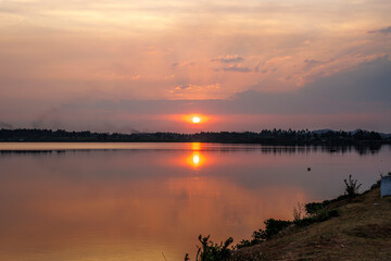 Naklejka premium Sunset at a lake in Hampi, Karnataka, India, Asia