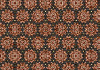 a large number of small floral patterns on a dark background