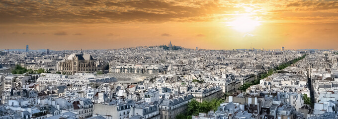 Aerial shot of the beautiful cityscape of Paris during the sunset