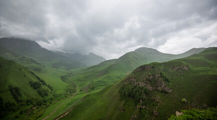 Cloudy and rainy day in spring, low storm clouds.Summer mountain landscape. Amazing view of the...