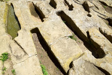 Rock-cut tombs in the church of San Juan in Uncastillo, Spain.