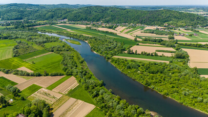 Dunajec river bend in picturesque landscape of Lesser Poland near Tarnow,. Aeral drone view.