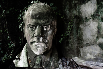 A damaged bust of Bolshevik leader Lenin in an abandoned cultural center in the Greek village of...