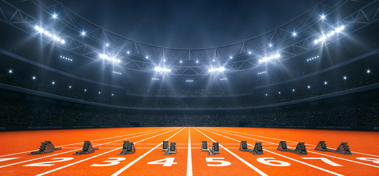 Modern athletics stadium at night and tartan running track ready for the sprint. Professional sports background for advertisement.