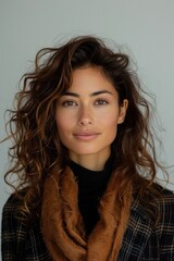 Fototapeta premium Captivating Portrait of Young Woman with Freckles and Flowing Hair