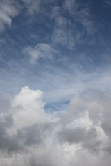 Obraz premium Blue sky. Beautiful Cumulus clouds flying across the sky,