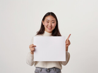 Fototapeta premium woman holding blank sign