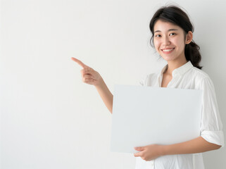 Fototapeta premium woman holding blank sign