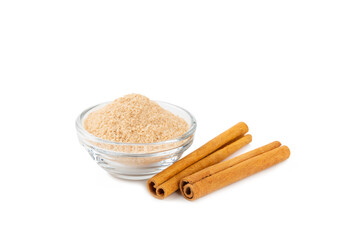 Cinnamon sugar isolated on white background. Homemade cinnamon sugar in a bowl on background. Brown sugar. Spice mixture for drinks and baking.