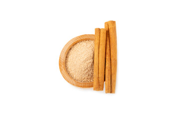 Cinnamon sugar isolated on white background. Homemade cinnamon sugar in a bowl on background. Brown sugar. Spice mixture for drinks and baking.