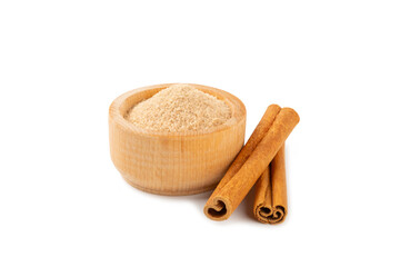 Cinnamon sugar isolated on white background. Homemade cinnamon sugar in a bowl on background. Brown sugar. Spice mixture for drinks and baking.