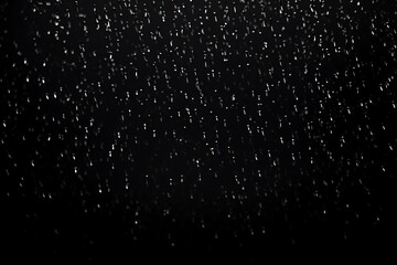 Obraz premium Texture of rain, overlay effect on black background,