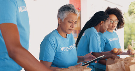 People, volunteering and tablet for food, charity and non profit donation with group, teamwork and...