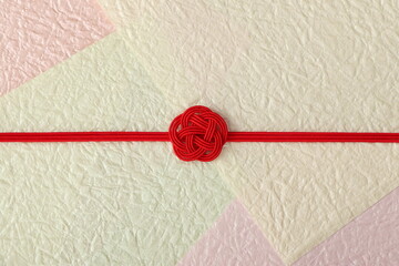 水引飾りの和風背景　梅結び　背景もみ紙使用