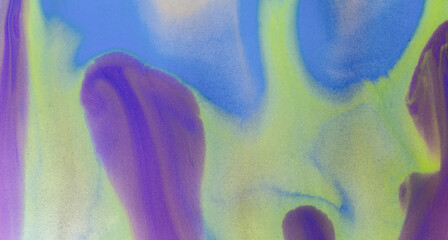 Abstract pastel marbled background with swirls in blue, yellow, and pink hues. 