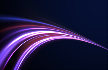 Light motion trails. High speed motion blurred light effects at night in blue and red colors. Glowing spark swirl trail tracing on dark blue background. Abstract light lines of movement and speed. 
