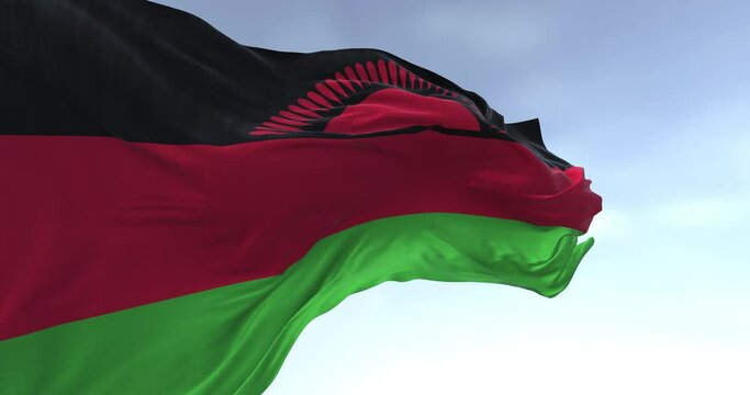 Close-up of Malawi national flag waving in the wind on a clear day