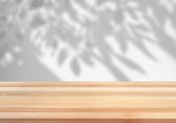 Empty wood desk top on wall texture with shadow background