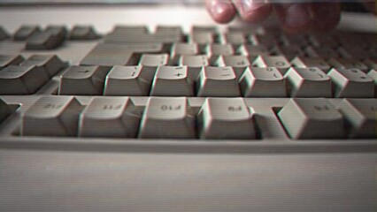 Computer engineer developer is working on old vintage computer 1990s. Antique classic pc keyboard and programmer typing hands. Internet web digital startup history. Outdated retro technology concept