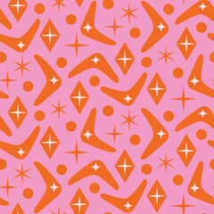 Mid Century Modern Boomerang seamless pattern with atomic retro stars and dots in orange on pink background. For home decor, textile, wallpaper and fabric.