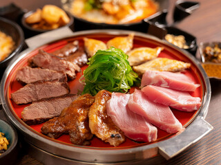 Traditional Japanese meat dishes with vegetable snacks