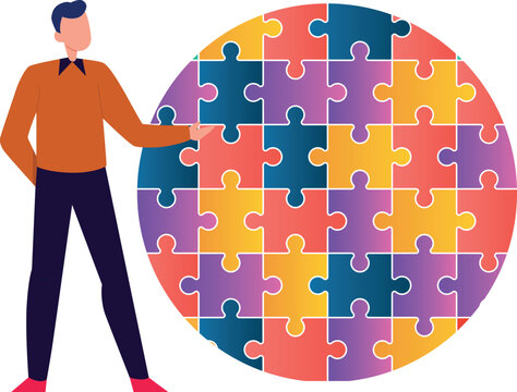 Boy is showing jigsaw puzzle.