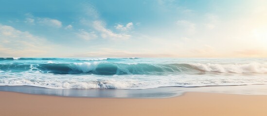 Fototapeta premium On the sunny beach there is a wave and there is also room for a copy space image
