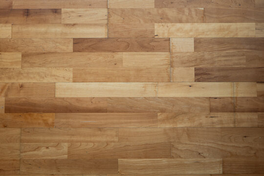 Wood parquette flooring inside apartment room, top view, no people