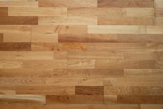 Wood parquette flooring inside apartment room, top view, no people