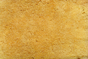 Detail of a slice of raw smoked tofu soaked in soy sauce