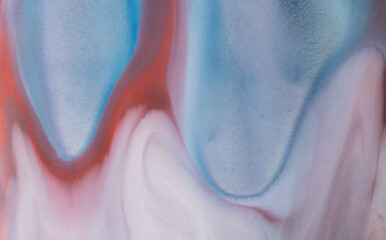 Swirls of vibrant blue, pink, and white merge fluidly, resembling an abstract.