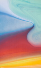 Vibrant acrylic paint flowing downwards on a surface, creating a colorful and dynamic abstract...