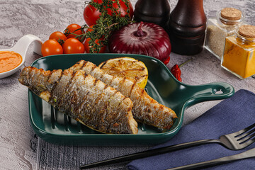 Grilled seabass fillet with lemon