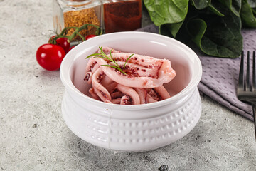 Marinated squid tentacles in the bowl