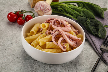 Italian cuisine - pasta tortiglioni with squid