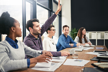 Businessman, team diversity and raising hand for question in boardroom, office and workspace for...