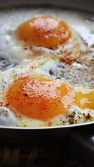 Eggs in a frying pan closeup