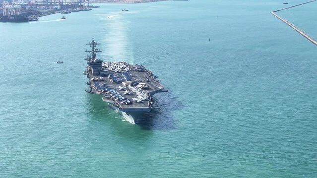 Nuclear Navy ship, Military navy ship carrier full loading fighter jet aircraft for prepare troops. nuclear carrier running in the ocean