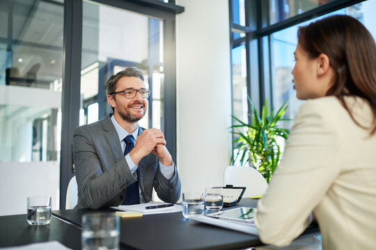 Businessman, meeting and interview with client for b2b, patnership or hiring at office. Business people or intern talking to executive for recruiting, discussion or explaining contract at workplace