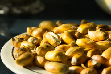 Macro photograph of Peruvian roasted corn cancha. Natural food concept.